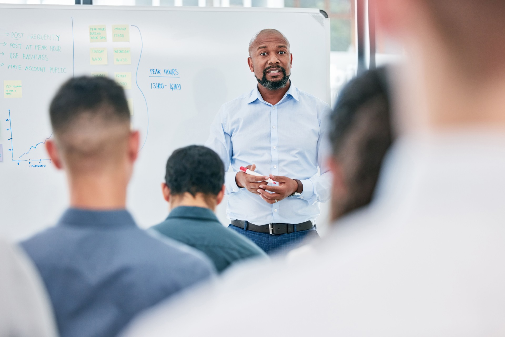 Cropped shot of a handsome mature businessman giving a presentation in the conference room