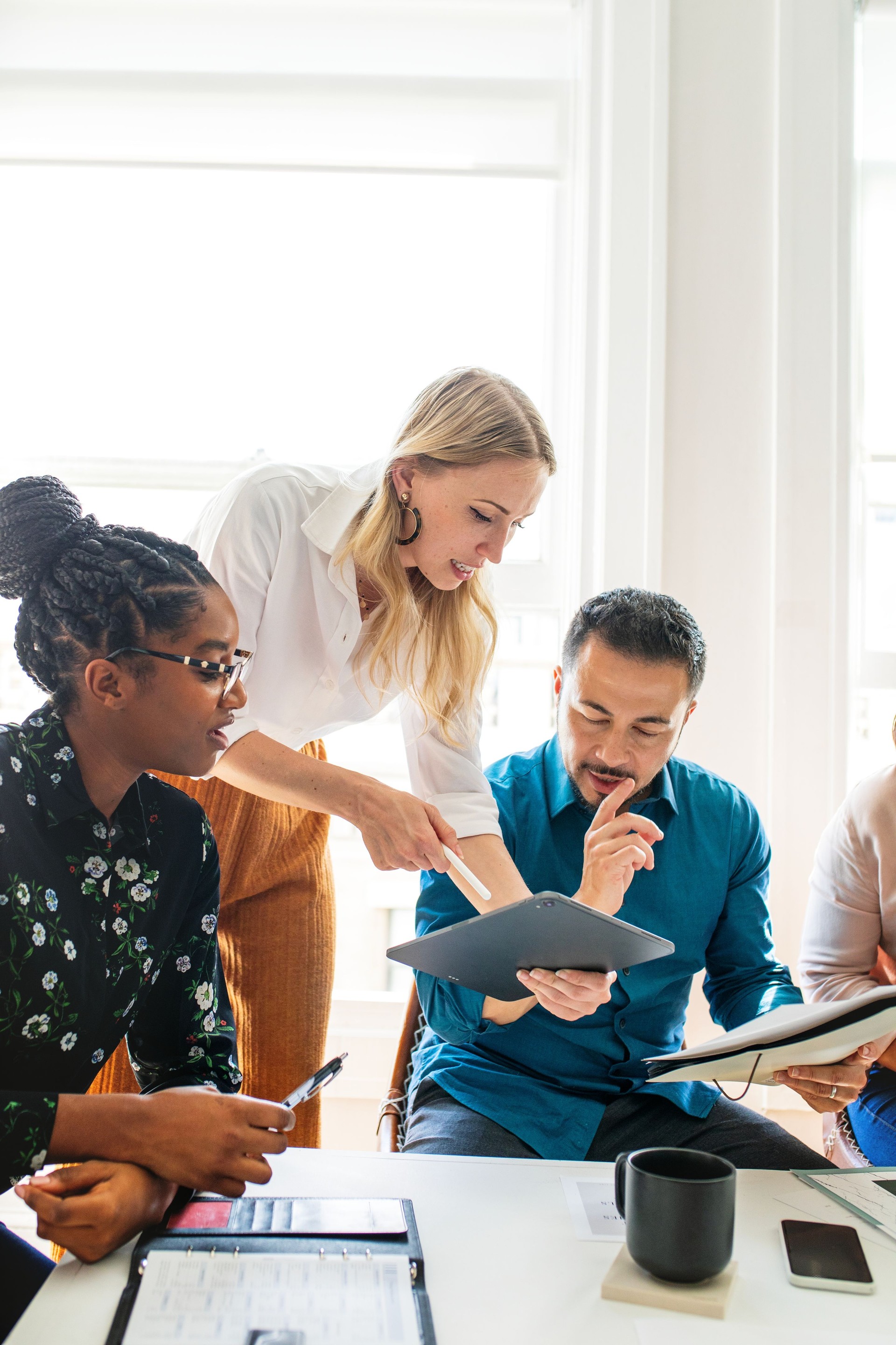Diverse team collaborating in an office.